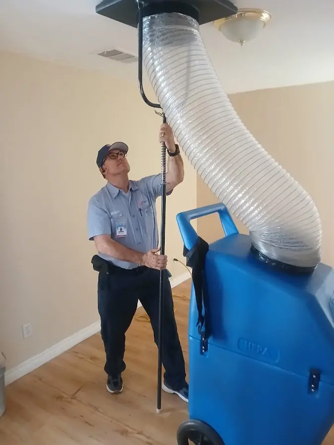 Mini Split Installation technician using HEPA equipment in Hapeville